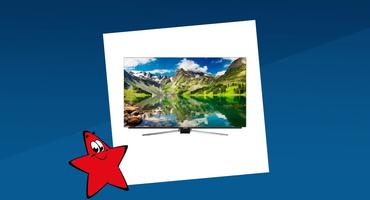 Grundig-Fernseher mit Berglandschaft auf dem Bildschirm